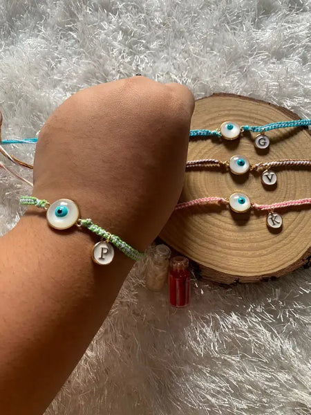 White evil eye Rakhi  With Alphabet