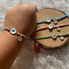 White evil eye Rakhi  With Alphabet
