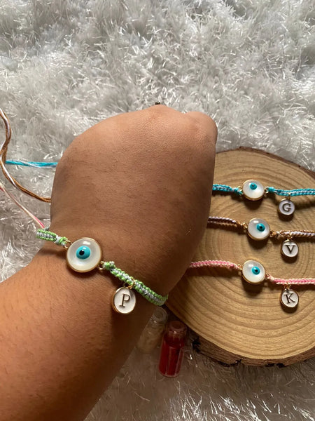 White evil eye Rakhi  With Alphabet