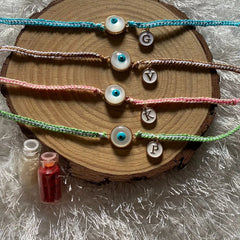 White evil eye Rakhi  With Alphabet
