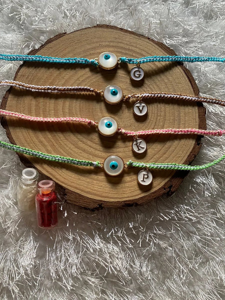 White evil eye Rakhi  With Alphabet
