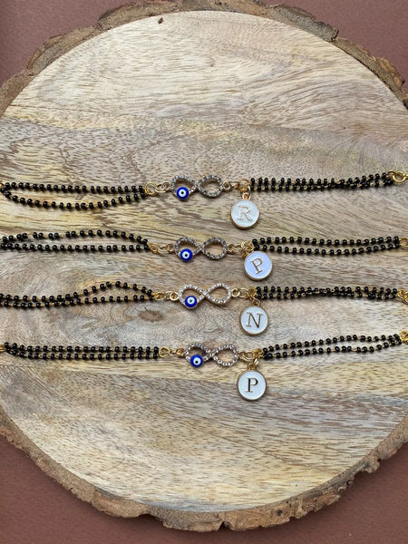 Nazariya Infinity Bracelet with Alphabet