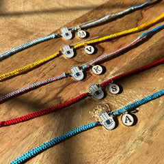 Saanjh Hamsa Rakhi with Alphabet