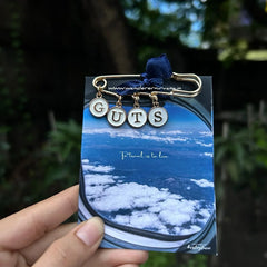 GUTS Brooch