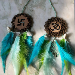 Swastik Ohm Dreamcatcher (Shades of Aqua) Aqua Swastik Ohm Dreamcatcher with shells and pearls Swastik Ohm Dreamcatcher for Diwali gifting