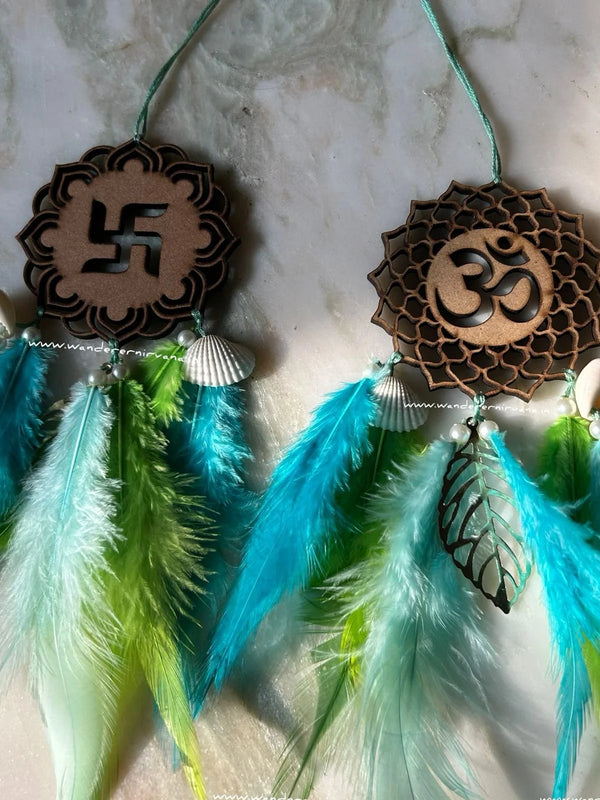 Swastik Ohm Dreamcatcher (Shades of Aqua) Aqua Swastik Ohm Dreamcatcher with shells and pearls Swastik Ohm Dreamcatcher for Diwali gifting