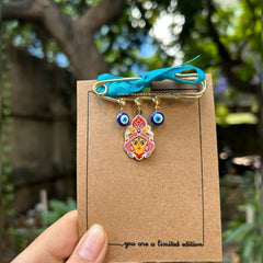 Durga brooch