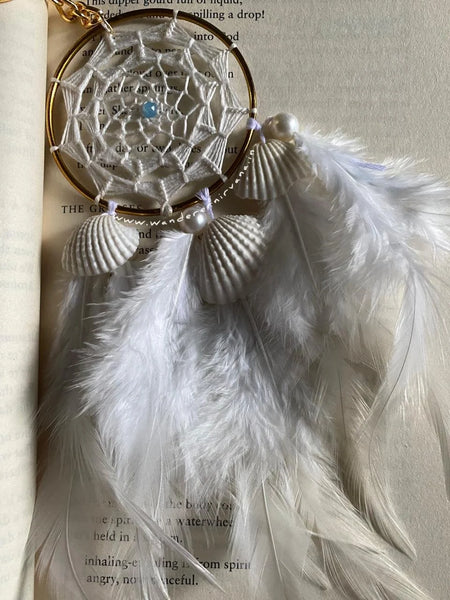 Baarishein Dreamcatcher White intricate Baarishein Dreamcatcher with blue bead Handmade Baarishein Dreamcatcher with shells and feathers