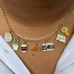 Vacation Mood Multi-Charm Neckpiece: Tea, plant, coffee, croissant, camera, girl power, and juice charms