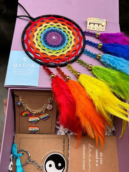 June Hamper Box: Lavender box, rainbow dreamcatcher, Ying Yang keychain, June Stack, My Pronouns Brooch, mini diary