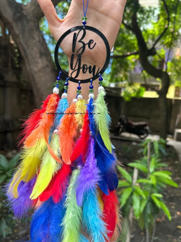 Be You Dreamcatcher with rainbow colors and white pearls Handcrafted Be You Dreamcatcher with vibrant shades Rainbow-themed Be You Dreamcatcher for home décor