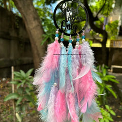 Good Vibes Dreamcatcher in pink, lavender, and blue shades Handcrafted Good Vibes Dreamcatcher with white pearls Elegant Good Vibes Dreamcatcher for home décor