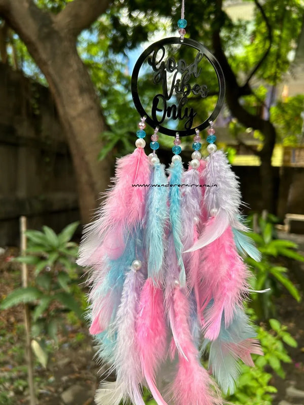 Good Vibes Dreamcatcher in pink, lavender, and blue shades Handcrafted Good Vibes Dreamcatcher with white pearls Elegant Good Vibes Dreamcatcher for home décor